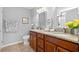 Bright bathroom features double sinks, granite countertops, and decorative seashell accents at 1536 Abberbury Dr., Conway, SC 29527