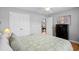 Bright bedroom featuring a view into the hall and a tall dark wood dresser at 1536 Abberbury Dr., Conway, SC 29527