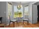 Bright breakfast nook with hardwood flooring and a picturesque view from the window at 1536 Abberbury Dr., Conway, SC 29527
