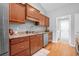 Kitchen boasts granite countertops, wood cabinets, stainless steel appliances, and hardwood flooring at 1536 Abberbury Dr., Conway, SC 29527