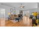 Open-concept living room with hardwood floors and comfortable seating areas at 1536 Abberbury Dr., Conway, SC 29527