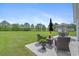 Outdoor patio featuring comfortable seating, landscaping, and a great view of the green backyard at 1536 Abberbury Dr., Conway, SC 29527