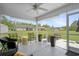 Relaxing screened porch featuring comfortable seating and views of the expansive backyard at 1536 Abberbury Dr., Conway, SC 29527