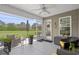 Enjoy outdoor living with this screened porch, complete with seating, ceiling fan, and views of the landscaped backyard at 1536 Abberbury Dr., Conway, SC 29527