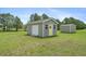 A practical backyard shed with a garage door and separate entrance, perfect for storage and hobbies at 1536 Abberbury Dr., Conway, SC 29527