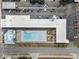 Aerial shot of the community pool, parking lot, and exterior at 1600 S Ocean Blvd. # 254, Myrtle Beach, SC 29577