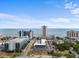 Expansive aerial shot featuring multiple hotels with beach access at 1600 S Ocean Blvd. # 254, Myrtle Beach, SC 29577