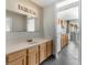 Bathroom with a single vanity, tile flooring, and access to the kitchen at 1600 S Ocean Blvd. # 254, Myrtle Beach, SC 29577