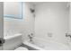 Full bathroom featuring a tiled tub, shower, and standard toilet at 1600 S Ocean Blvd. # 254, Myrtle Beach, SC 29577