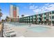 Exterior view of the community pool and surrounding lounge chairs at 1600 S Ocean Blvd. # 254, Myrtle Beach, SC 29577