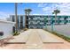 Shuffleboard court with tropical landscaping and hotel in the background at 1600 S Ocean Blvd. # 254, Myrtle Beach, SC 29577