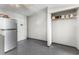 Utility room with tile flooring, drop ceiling, and adjacent to kitchen and bathroom at 1600 S Ocean Blvd. # 254, Myrtle Beach, SC 29577