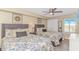 Comfortable bedroom with two beds, a ceiling fan, and coastal-themed decorations at 1625 S Ocean Blvd. # 1210, North Myrtle Beach, SC 29582