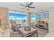 Cozy living room with ocean view, comfortable seating, and large windows perfect for relaxation at 1625 S Ocean Blvd. # 1210, North Myrtle Beach, SC 29582