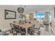 Combination living space with dining table, living room seating, and a view of the ocean horizon at 1625 S Ocean Blvd. # 1210, North Myrtle Beach, SC 29582