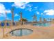 Relaxing pool and hot tub area offering views of the ocean and surrounded by comfortable lounge chairs at 1625 S Ocean Blvd. # 1210, North Myrtle Beach, SC 29582
