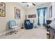 Bright bedroom with neutral carpet, a ceiling fan, and stylish decor at 1681 Suncrest Dr., Myrtle Beach, SC 29577