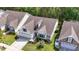 Charming single-Gathering home with a well-manicured front lawn, two-car garage, and beautiful landscaping at 1681 Suncrest Dr., Myrtle Beach, SC 29577