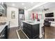 Open concept kitchen showcases granite counters, stainless appliances, and seamless flow to living spaces at 1681 Suncrest Dr., Myrtle Beach, SC 29577