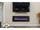 Comfortable living room with a modern fireplace and a mounted flatscreen TV at 1681 Suncrest Dr., Myrtle Beach, SC 29577