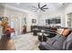 Spacious living room area featuring dark wood floors and an open view to the kitchen at 1681 Suncrest Dr., Myrtle Beach, SC 29577