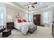 Bright and airy main bedroom with tray ceilings, large windows, and neutral decor at 1681 Suncrest Dr., Myrtle Beach, SC 29577