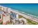 Aerial view featuring beachfront condos, a sandy beach, and oceanfront access at 1709 S Ocean Blvd. # 403, North Myrtle Beach, SC 29582
