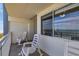 Condo balcony offering ocean views and comfortable rocking chairs at 1709 S Ocean Blvd. # 403, North Myrtle Beach, SC 29582