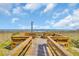 Wooden walkway leading to sandy beach with ocean views and dunes at 1709 S Ocean Blvd. # 403, North Myrtle Beach, SC 29582