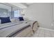 Bright bedroom with two twin beds and a window with blinds at 1709 S Ocean Blvd. # 403, North Myrtle Beach, SC 29582
