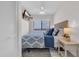 Cozy bedroom with a comfy bed and ocean views from the bright window at 1709 S Ocean Blvd. # 403, North Myrtle Beach, SC 29582