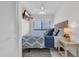 Bright bedroom with ocean view, a comfortable bed, and a flat screen TV at 1709 S Ocean Blvd. # 403, North Myrtle Beach, SC 29582