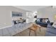 Inviting living room with open layout, dining space and a peek into the kitchen at 1709 S Ocean Blvd. # 403, North Myrtle Beach, SC 29582