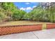 Backyard with level patio and brick wall, with room for all activities at 1729 Longleaf Dr., Myrtle Beach, SC 29575