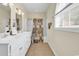Bright bathroom featuring a dual sink vanity and shower-tub combo at 1729 Longleaf Dr., Myrtle Beach, SC 29575