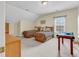 Charming bedroom with two twin beds, neutral walls, and lots of natural light at 1729 Longleaf Dr., Myrtle Beach, SC 29575