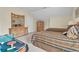 Cozy bedroom featuring twin beds and an entertainment table for flexible use at 1729 Longleaf Dr., Myrtle Beach, SC 29575