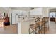 Open kitchen with breakfast bar, white cabinets, modern appliances and tile floors at 1729 Longleaf Dr., Myrtle Beach, SC 29575