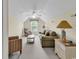Cozy living room with a ceiling fan, lots of seating, and a view of the yard at 1729 Longleaf Dr., Myrtle Beach, SC 29575