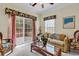 Bright living room with comfortable seating and a sliding door to the outside at 1729 Longleaf Dr., Myrtle Beach, SC 29575