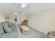 Bright living room with neutral walls and a view of an additional room at 1729 Longleaf Dr., Myrtle Beach, SC 29575