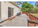 Back patio area with brick accents and sliding glass door to the house at 1729 Longleaf Dr., Myrtle Beach, SC 29575