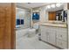 Bathroom featuring a shower and granite countertop vanity at 200 76Th Ave. N # 301, Myrtle Beach, SC 29572