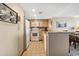Bright kitchen featuring tile floors, granite countertops, and matching appliances in a cozy home at 200 76Th Ave. N # 301, Myrtle Beach, SC 29572