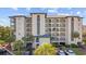 Beautiful condo building featuring multiple balconies and attractive landscaping near the parking area at 200 Lands End Blvd. # 3015, Myrtle Beach, SC 29572