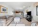 Bright living room featuring comfortable seating and an open view to the kitchen and dining area at 200 Lands End Blvd. # 3015, Myrtle Beach, SC 29572
