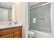 Cozy bathroom featuring a vanity and a shower with sliding glass doors at 209 75Th Ave N # T-8, Myrtle Beach, SC 29572