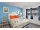 Bright bedroom with a view, featuring a cozy bed, modern furnishings, and cheerful accents at 209 75Th Ave N # T-8, Myrtle Beach, SC 29572