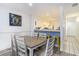 Dining area with seating for six, open to the kitchen with bar-style counter seating at 209 75Th Ave N # T-8, Myrtle Beach, SC 29572