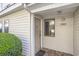 Charming townhouse exterior with well-maintained landscaping and a welcoming front entrance at 209 75Th Ave N # T-8, Myrtle Beach, SC 29572